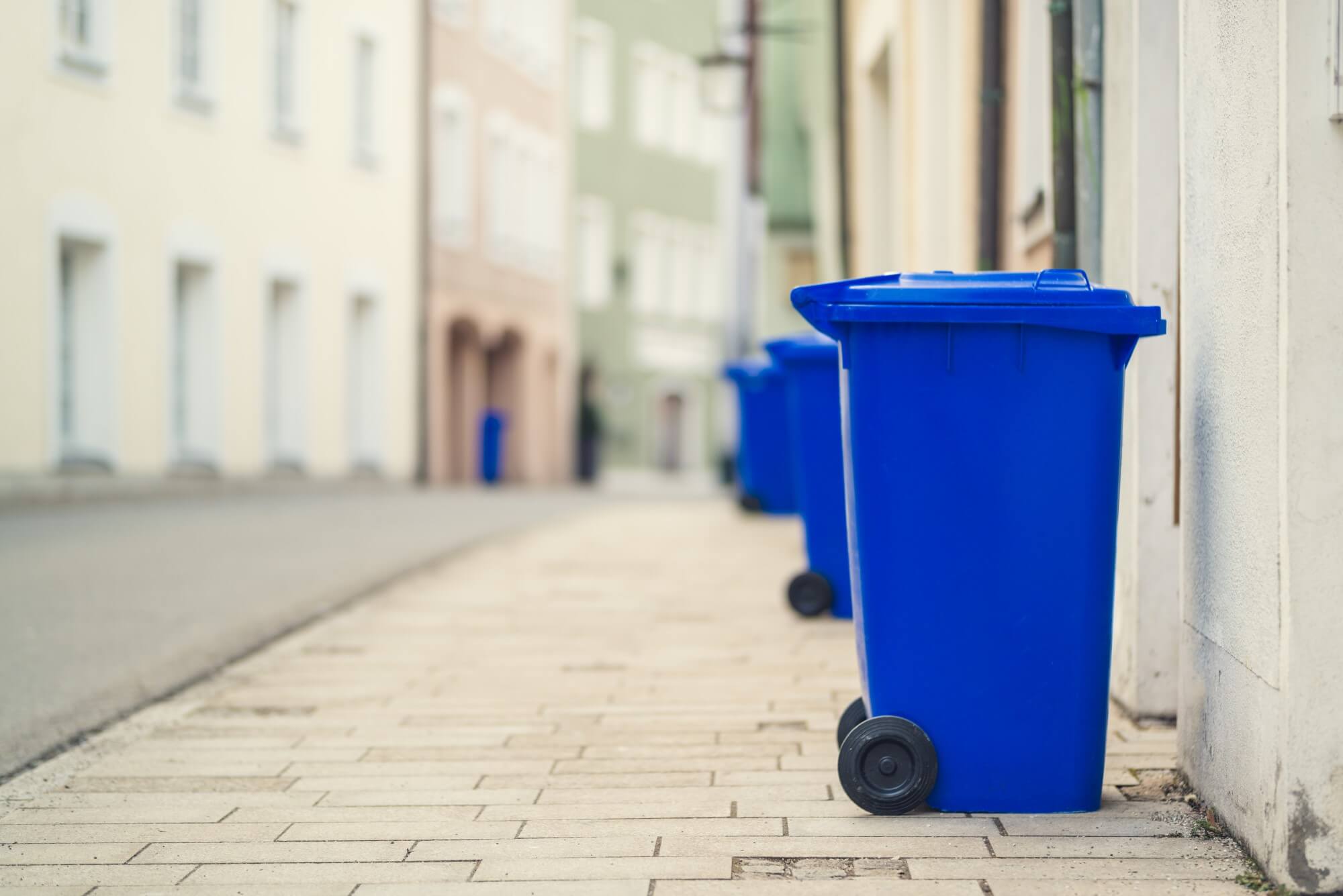 A shredding bin out on the side of the street